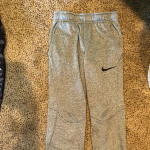 Nike youth med dri fit pants.  Heather grey.